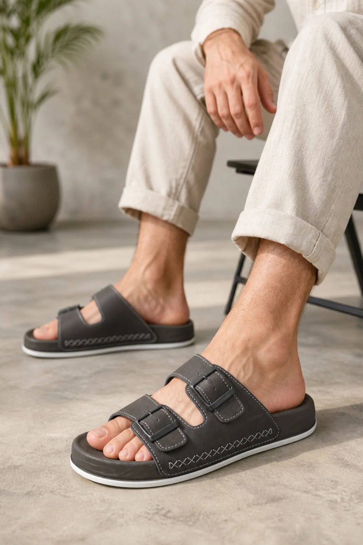 Men's dark gray slide sandals with two adjustable straps and cushioned footbed
