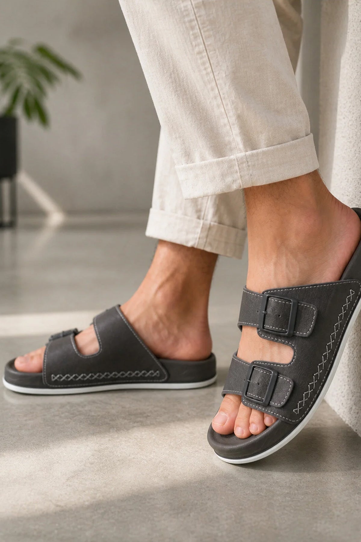 Men's dark gray open-toe slippers with double straps and stitched trim