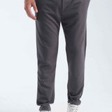 Men's gray sweatpants, front view, elastic cuffs and drawstring