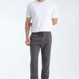 Men's gray sweatpants with drawstring waistband and tapered legs