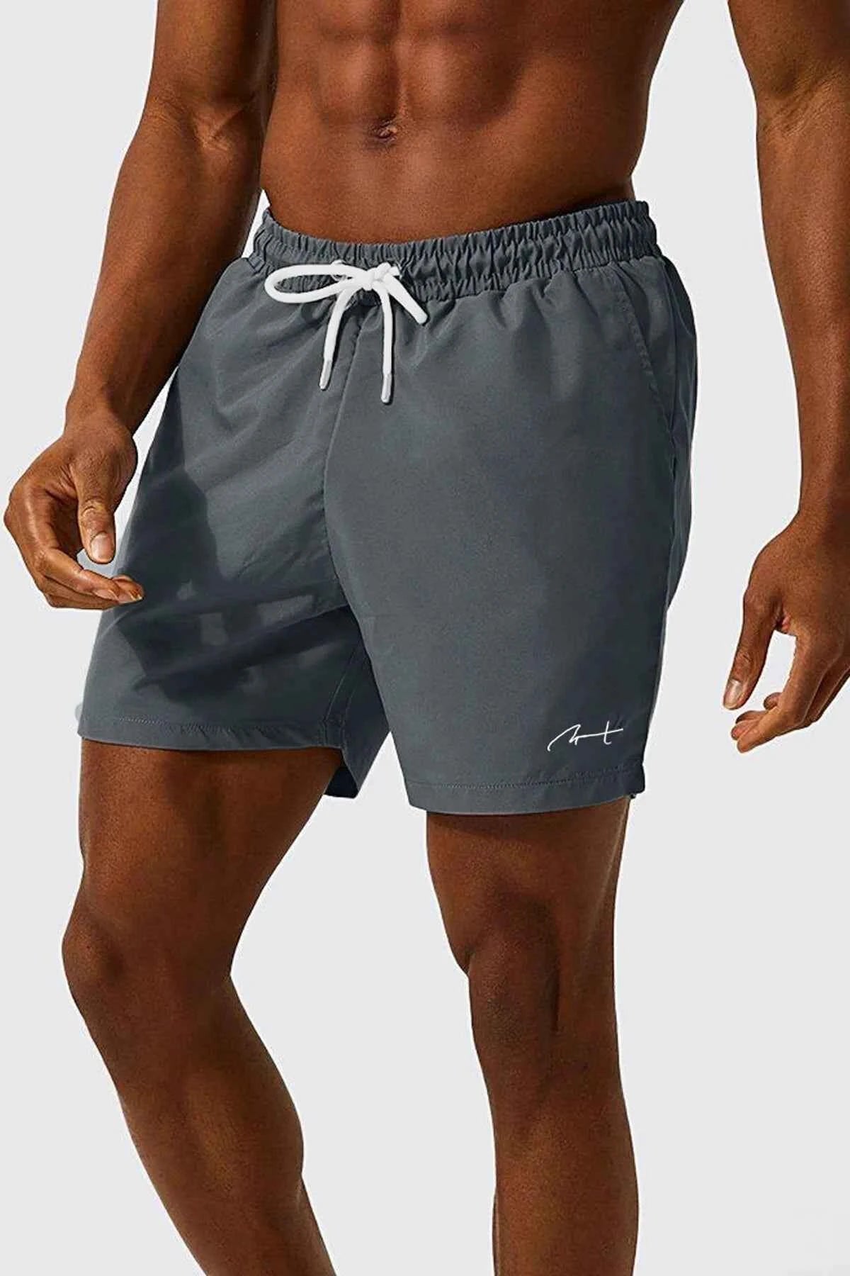 Men's gray swim shorts front view, white drawstring and side logo