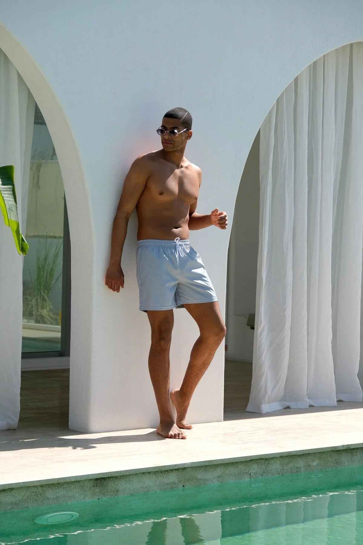 Mayom men's gray swimming shorts, standing side view