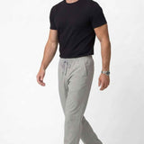 Men's gray track pants with elastic drawstring waist and side pockets