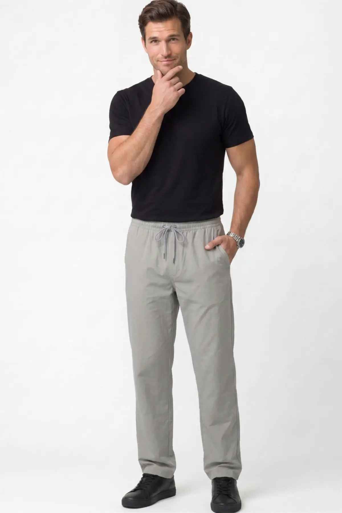 Men's gray track pants with tapered legs and elastic drawstring waist