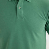 Men's Serin green polo shirt neckline with button placket and collar tips