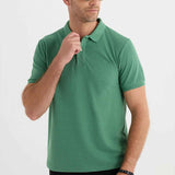 Men's Serin green polo shirt with short sleeves and three-button placket