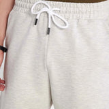 Men's light grey shorts with elastic waistband and white drawstring