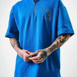Men's half-zip oversize T-shirt, blue, front half-zip and small chest emblem