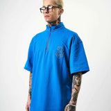 Men's half-zip embroidered oversize T-shirt, blue, front half-zip with emblem