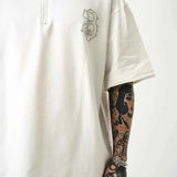 Men's oversize half-zip T-shirt, white; half-zip collar and small chest logo