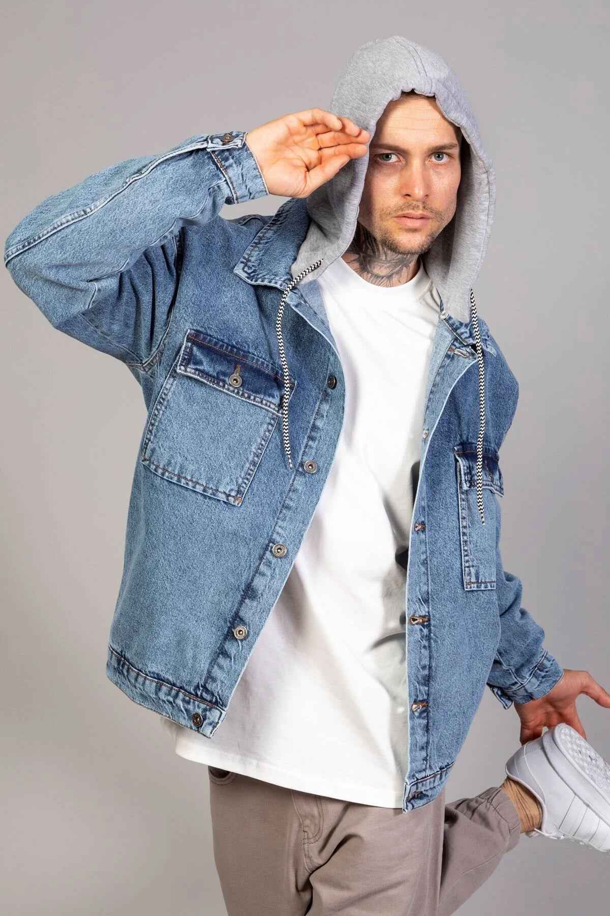 Oversized ice blue denim jacket with gray hood lining, hood up style