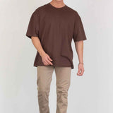 Men's beige jeans, front view with button closure and five-pocket styling