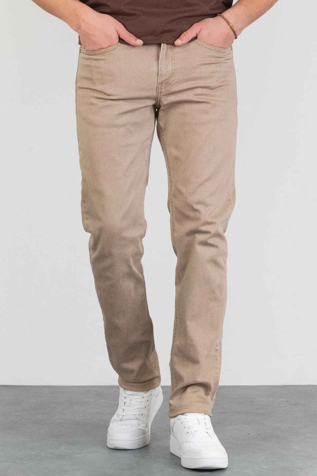 Men's beige jeans with front center seam, belt loops, and straight-leg fit