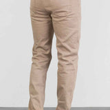 Men's beige jeans with back yoke stitching, button waist, and straight legs