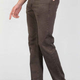 Men's dark brown jeans with tapered leg, front button, and side seam pockets.