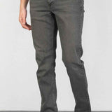 Men's gray jeans with button closure, belt loops, and front pockets