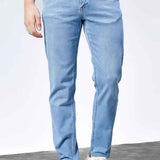 Light blue slim jeans with belt loops, button closure, and five pockets