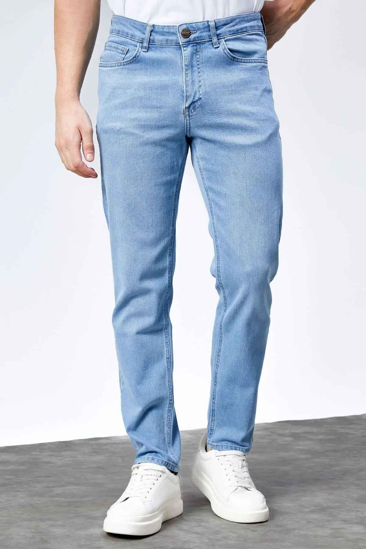 Light blue slim jeans with belt loops, button closure, and five pockets