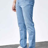 Light blue jeans, side view, with five-pocket styling and belt loops