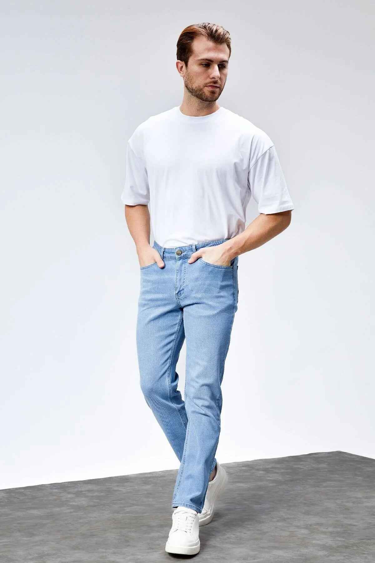 Light blue jeans with straight legs, front pockets, and button fly