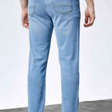 Light blue jeans back view with yoke, back pockets, and belt loops
