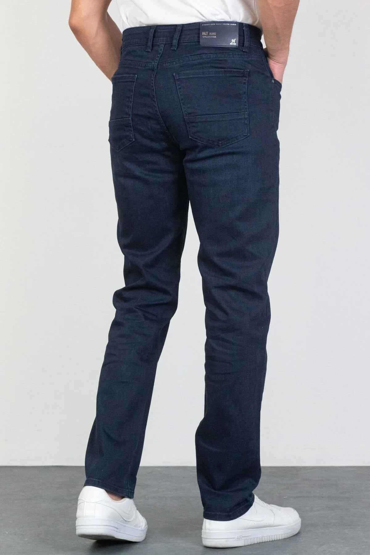 Men's navy jeans, back view with belt loops and rear yoke seams