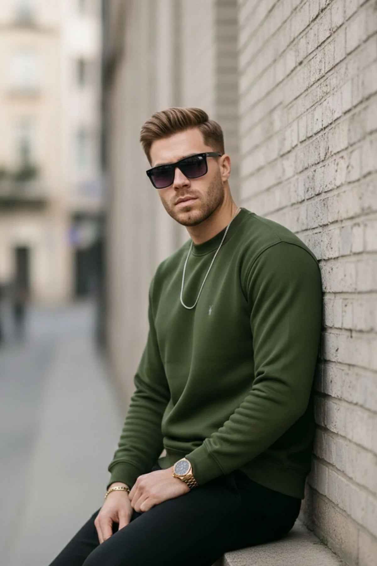 Men's crewneck sweatshirt with ribbed cuffs and hem, small chest logo, side view