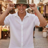 Men's Ritar bucket hat, dark olive with wide brim and stitched crown.