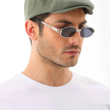 Men's khaki flat cap by Ritag, side profile view, curved brim and stitched crown