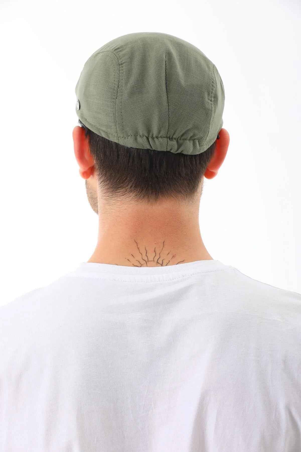 Men's khaki flat cap by Ritag, back view, gathered seam at the crown