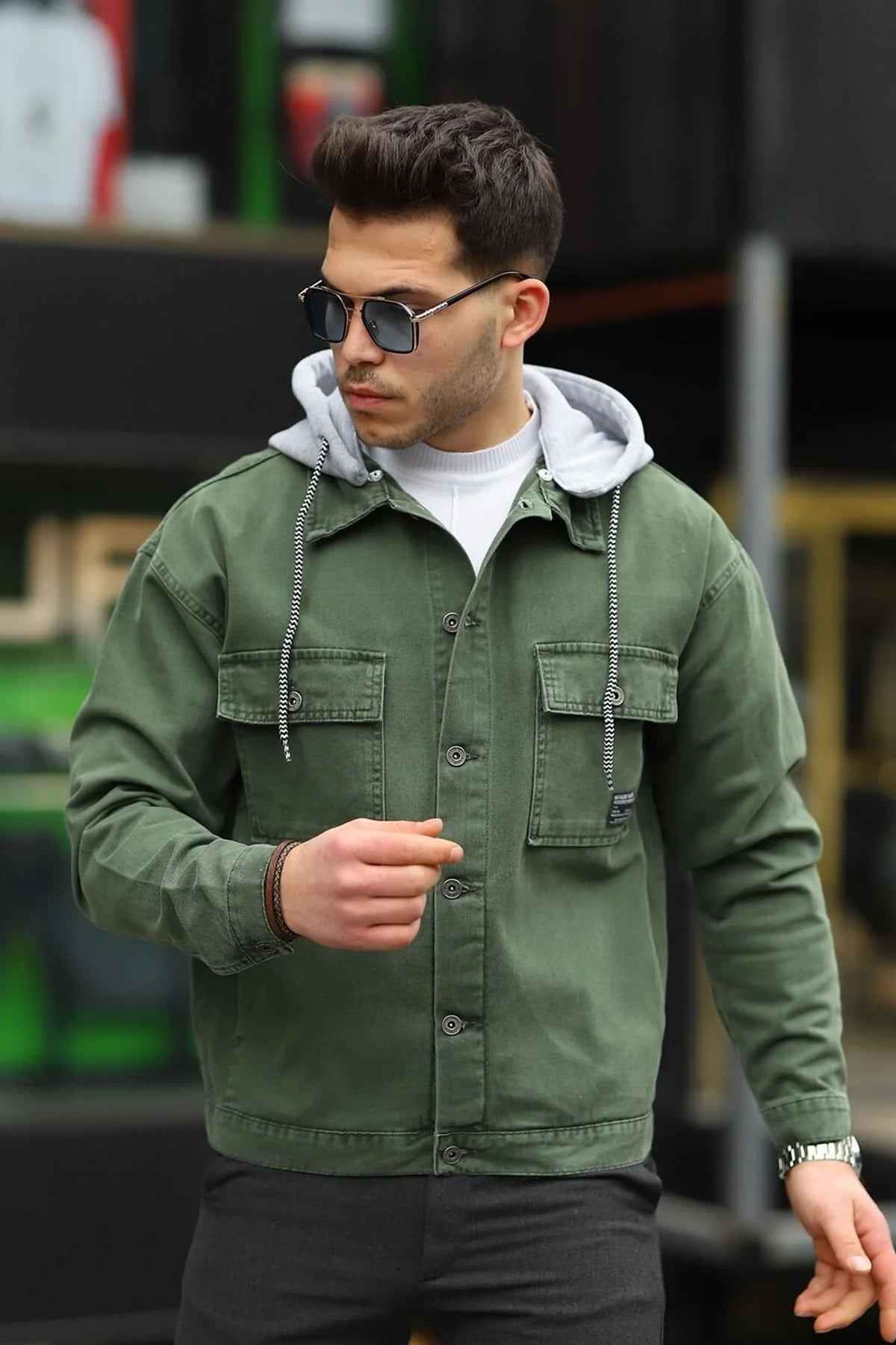 Men's oversized olive denim jacket with flap pockets and button front