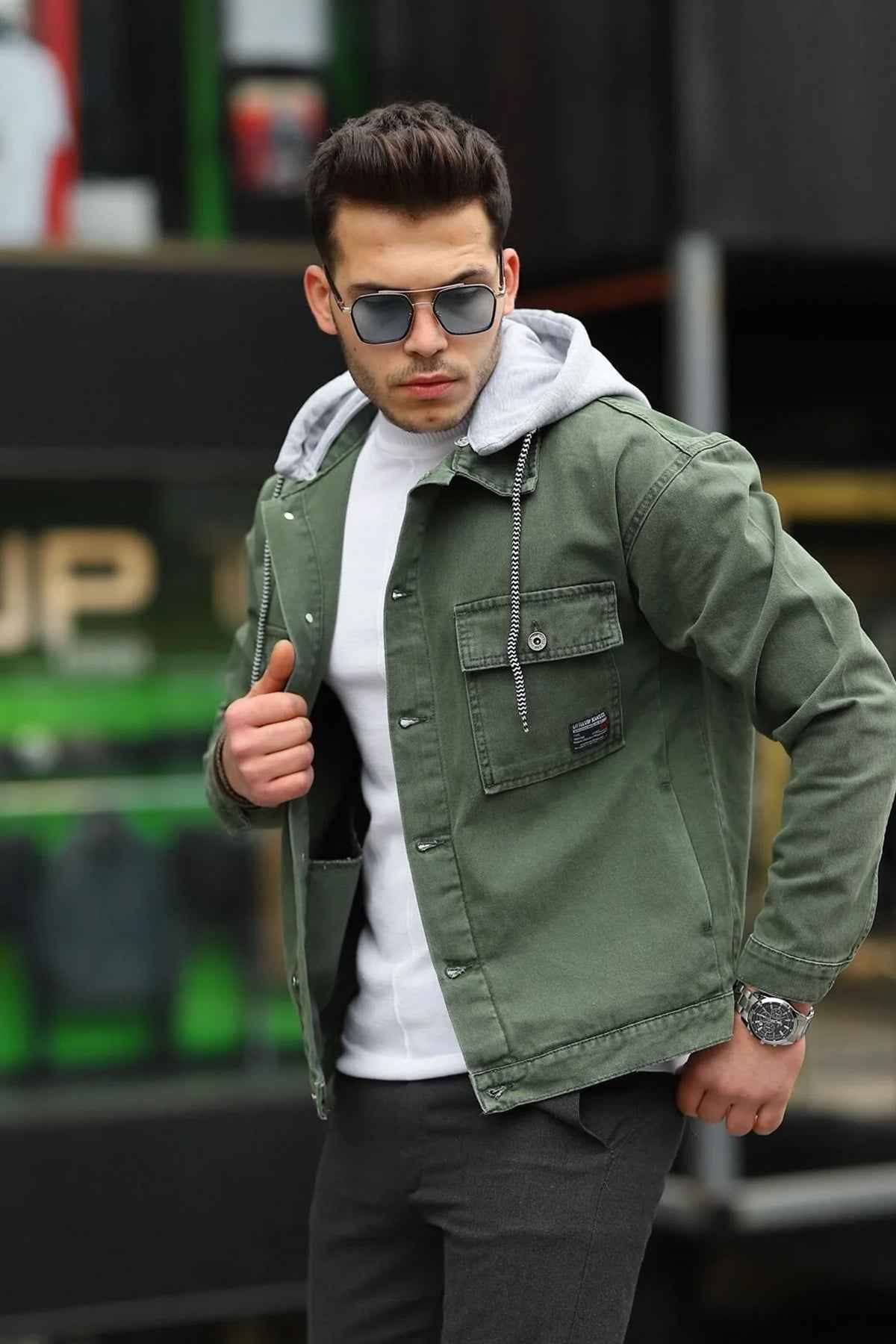 Men's oversized olive denim jacket with flap chest pocket and button front