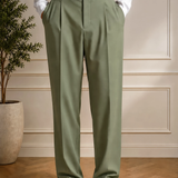 Men's olive dress pants with black belt, front pleats, and straight legs