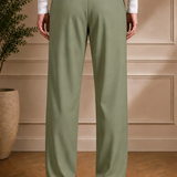 Men's olive dress pants back view with black belt and back welt pockets