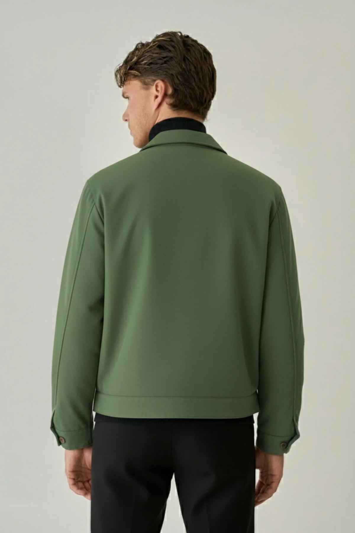 Back view of men's green jacket with stand collar and zip front