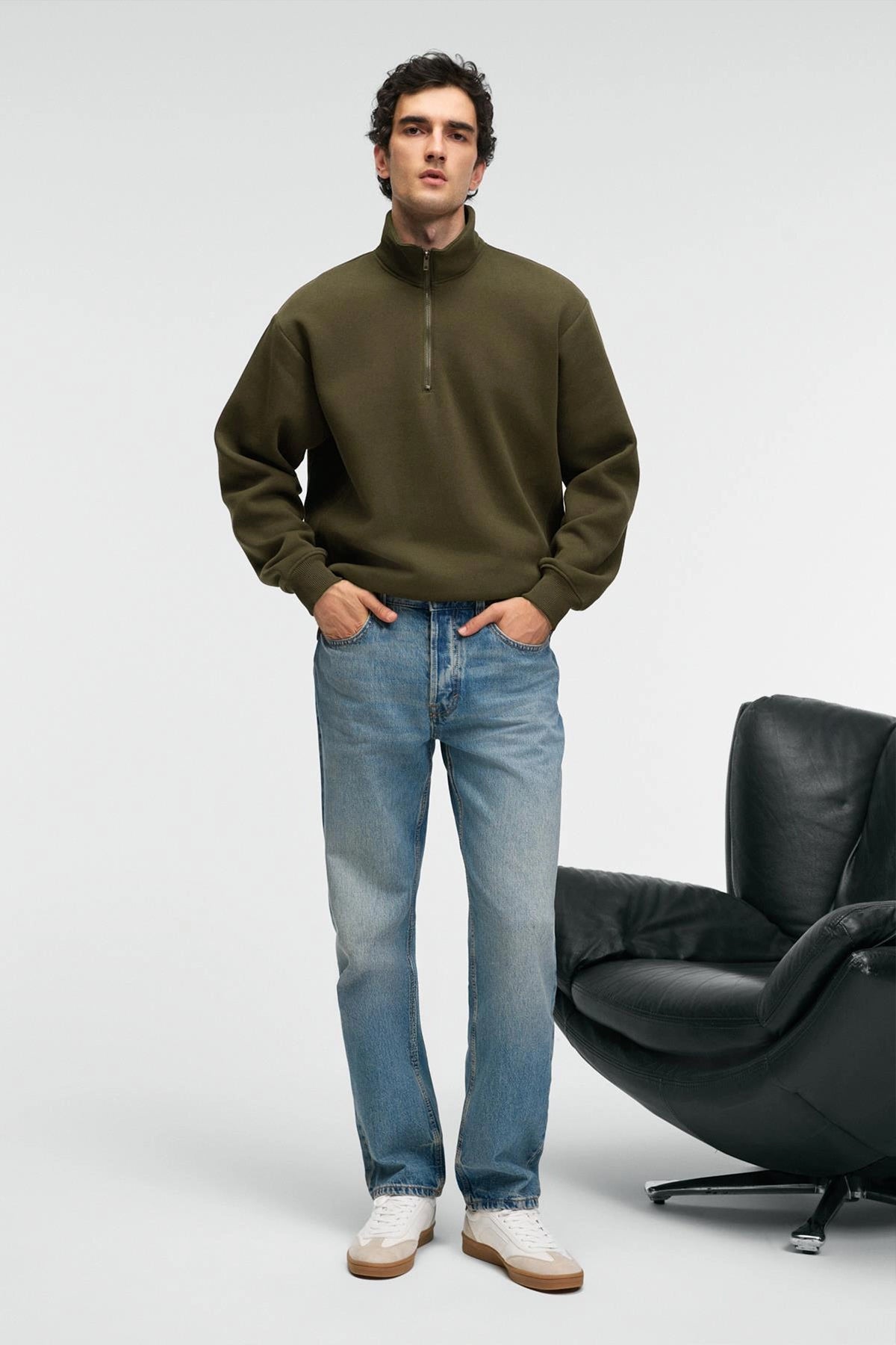 Olive zip stand-collar sweatshirt, relaxed fit, full body standing