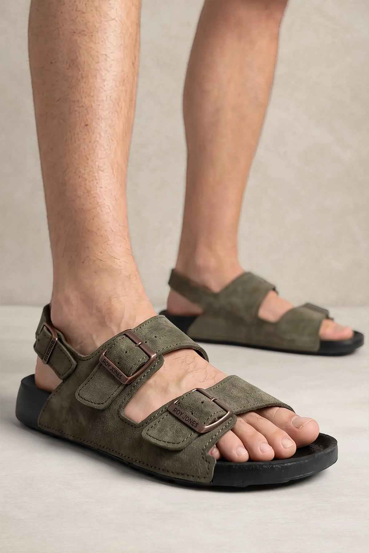 Men's RJ khaki sandals with two adjustable buckle straps and open toe, black rubber sole
