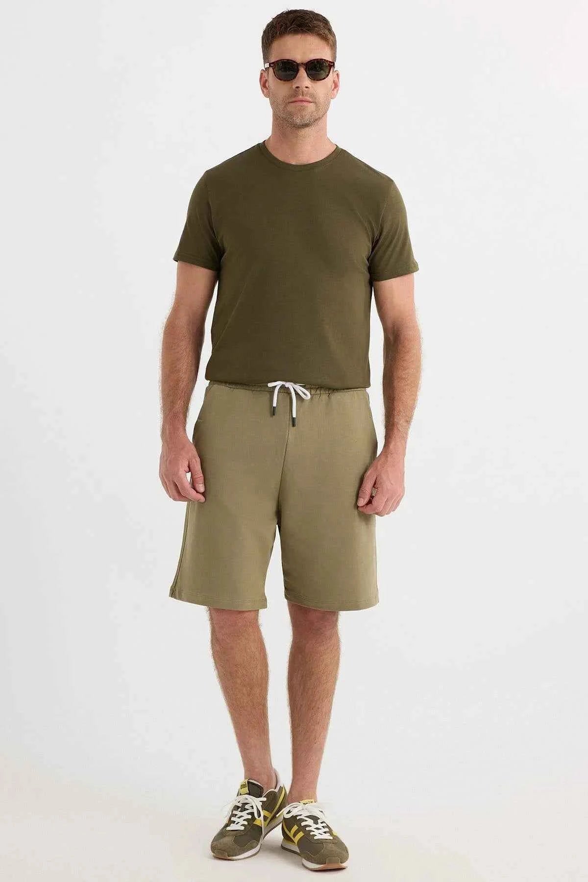 Men's olive khaki shorts, knee length, with white drawstring waist
