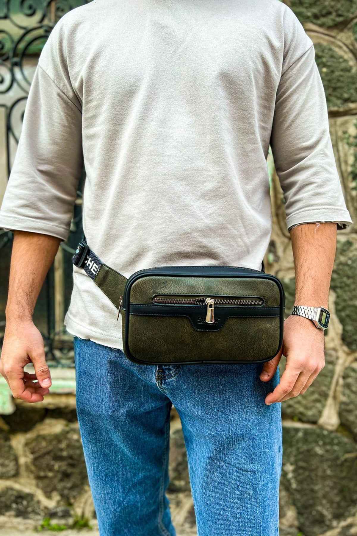 Men's khaki tablet bag with front zipper pocket and adjustable crossbody strap