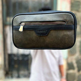 Khaki tablet bag front view with top handle and central flap zipper pocket