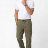 Men's khaki track pants with elastic drawstring waistband, ankle cuffs