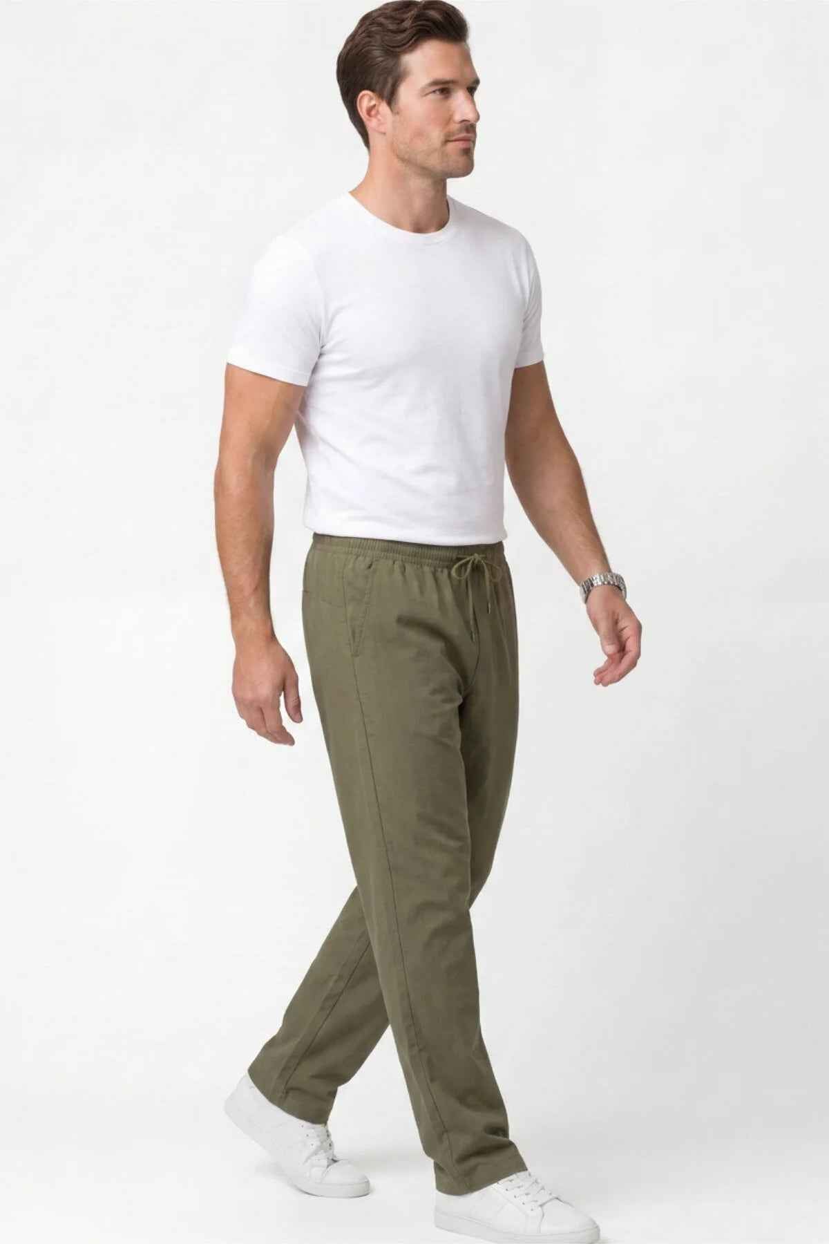Men's khaki track pants, side view, elastic drawstring waist and tapered legs