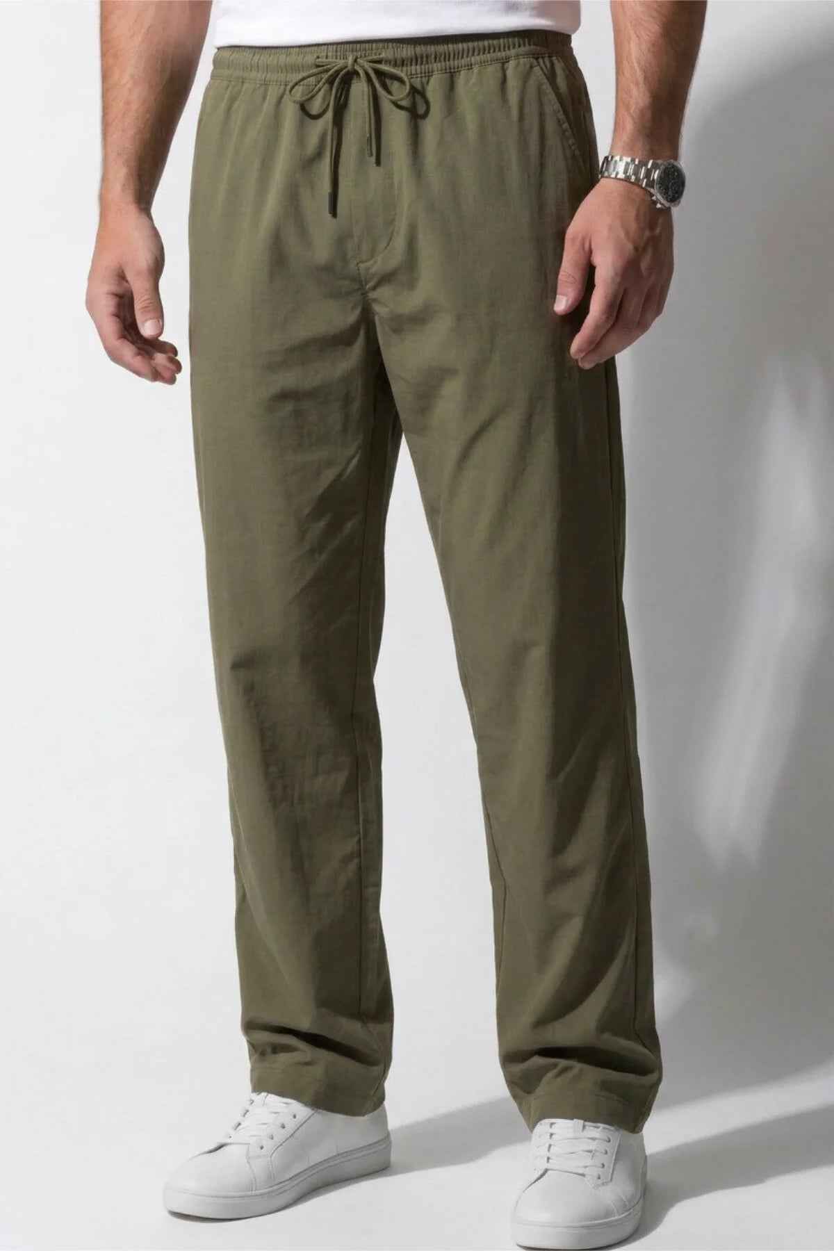 Men's khaki track pants front close-up, drawstring elastic waist, side pockets