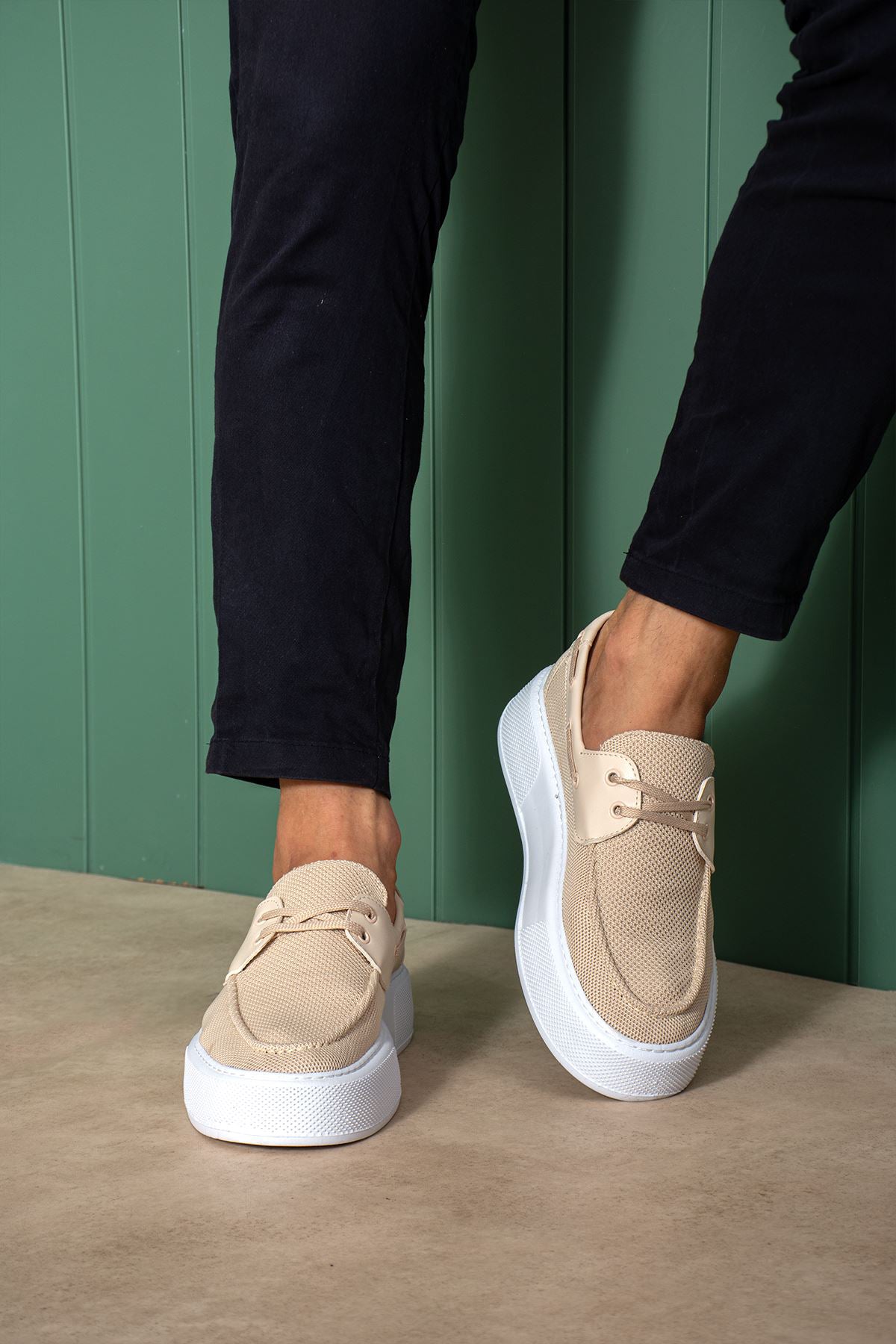 Beige knit lace-up sneakers with white sole, rear quarter view