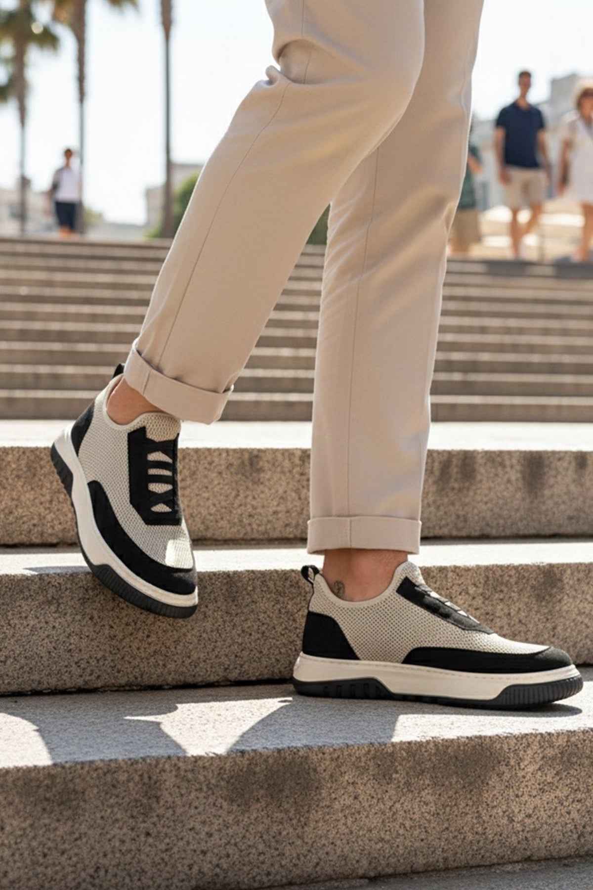 Men's knit sneakers, beige and black with striped side panels and lace-less look