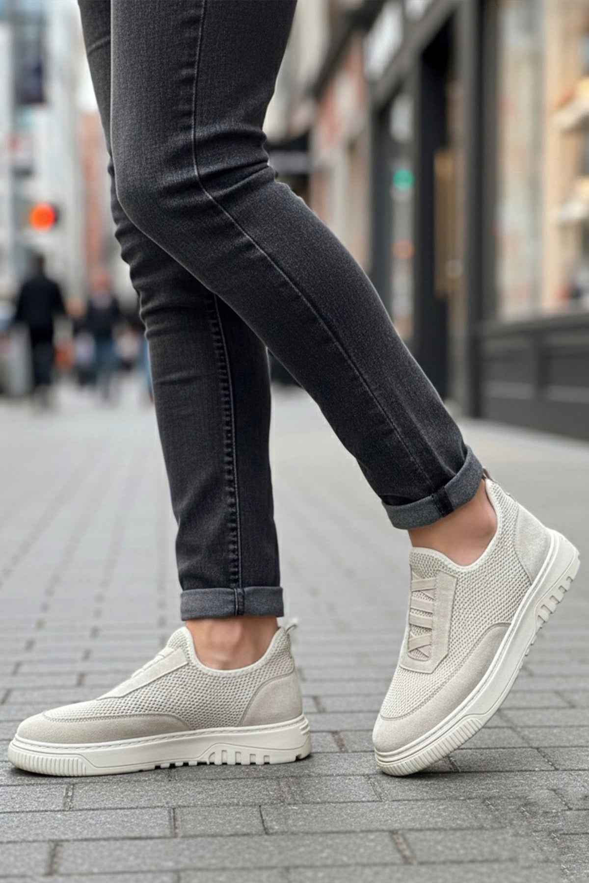 Light beige knit sneakers, side view with laced upper and textured white sole