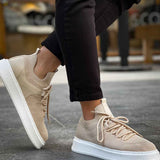 Beige knit sneakers with lace-up design and white sole, low side angle