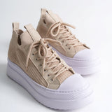 Men's beige knit sneakers, side view, with lace-up closure and white sole