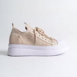 Men's beige knit sneaker with thick white sole and lace-up upper