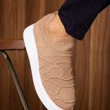 Beige knit sneakers with white rubber sole, side knit pattern